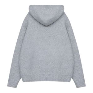 Sweat à capuche gris chiné doux et confortable en mélange de coton avec poche kangourou et cordon de serrage réglable, idéal pour un usage décontracté en hiver - Product Image 2
