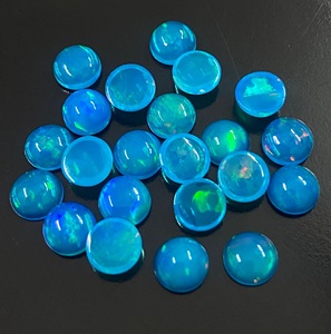 พลอยโอปอลสีน้ำเงินทรงกลมเจียระไนแบบบริลเลียนท์  ธรรมชาติ  มีการเปลี่ยนสี  สำหรับทำเครื่องประดับ  ขัดเงาแล้ว  จากราชสถาน - Product Image 1