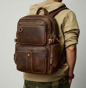 Sac à dos pour ordinateur portable en cuir véritable de qualité supérieure pour homme, léger et durable, idéal pour les voyages d'affaires et l'usage quotidien - Product Image 1