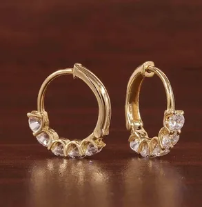 Boucles d'oreilles créoles pour femmes Tishya en or jaune massif 14 carats avec diamants moissanite 3 carats taille ronde, portés à l'intérieur et à l'extérieur de l'oreille - Product Image 1