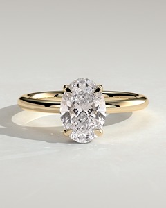 แหวนเพชรทรงรี 2 กะรัต ทองคำแท้ 14K เพชรเลี้ยงในห้องปฏิบัติการ คุณภาพ E VVS2 ประดับแบบกรงเล็บ พร้อมวงแหวนซ่อนรอบเพชร ดีไซน์หรูหราสำหรับเจ้าสาว ปี 2026 - Product Image 1