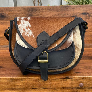 กระเป๋าหนังวัวแบบตะวันตกทรงกลมมีฝาปิดกระเป๋าหนังแท้แบบพรีเมี่ยมกระเป๋าหนังแท้แบบพิเศษสีดำและสีขาวสำหรับผู้หญิง - Product Image 2