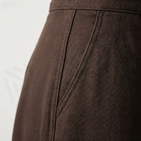 Jupe élégante pour femme, taille haute, coupe évasée, longueur genou, couleur unie, boutonnée devant, en tissu de laine, confortable, à porter toute l'année