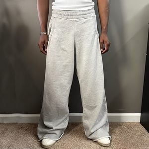 Pantalones de chándal de algodón personalizados OEM, de cintura alta, pierna ancha recta, estilo desgastado, lisos, holgados para hombre - Product Image 1