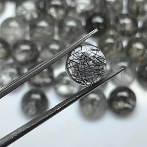 พลอยคุณภาพดีขายส่ง ควอตซ์รูไทล์สีดำธรรมชาติ ขนาด 9 มม. ทรงกลมแบบคาโบชอง ผิวเรียบ สำหรับแหวน จี้ เครื่องประดับ จัดแสดงในสหรัฐอเมริกา - Product Image 1