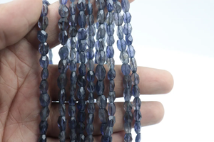 Cuentas de forma ovalada facetadas de iolita Cuentas de rondelle facetadas de iolita de 3x5mm - Product Image 2