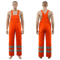 Salopette de travail orange avec bandes réfléchissantes, bretelles réglables, pantalon de sécurité robuste