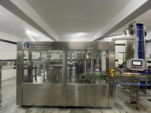 Machine de remplissage automatique d'eau minérale et de boissons, 12 buses, 7200 BPH, équipement d'emballage de bouteilles PET haute précision - Product Image 1