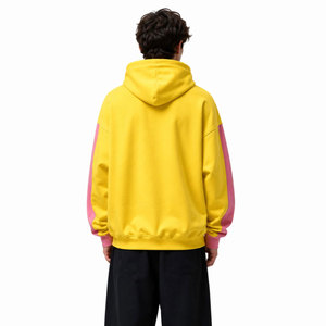 Sudadera con Capucha Unisex Oversize de Algodón French Terry con Bloques de Color Amarillo y Rosa, Diseño de Bolsillo y Estampado por Transferencia Térmica - Product Image 5