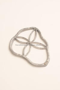 Eco Friendly Metal Sculpted <b>Trivet</b> Crafted From Recycled Materials Offering Sustainable Design And Artistic Home Accent - Product Image 5