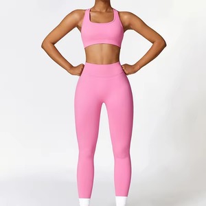 Conjunto de yoga sin costuras de cintura alta para mujer, ropa de gimnasio, conjunto de sujetador deportivo sin mangas con logo frontal sólido - Product Image 1