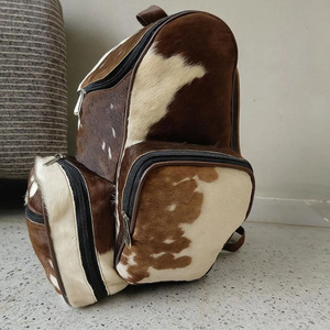 Wholesale cowhide leather hair student <b>backpacks</b> OEM supplier custom logo premium export quality school bags in affordable price - Product Image 4