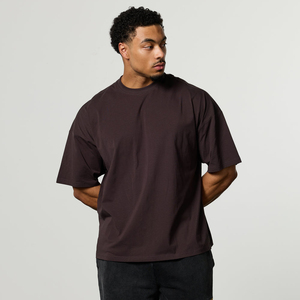 Camiseta de algodón de color sólido extragrande para hombre, cuello redondo, manga corta, corte informal - Product Image 1