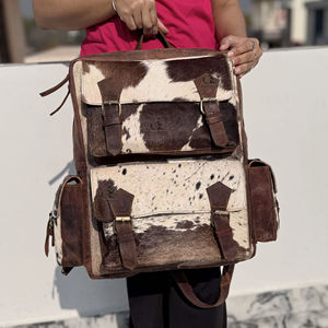 กระเป๋าเป้หนังวัวแท้รุ่นใหม่ล่าสุด ปี 2026 ดีไซน์เก๋ไก๋ทันสมัย เหมาะสำหรับใช้ในโรงเรียน  กระเป๋าเป้หนังแท้สำหรับทุกเพศ  กระเป๋าดีไซน์เนอร์สุดพิเศษ - Product Image 1