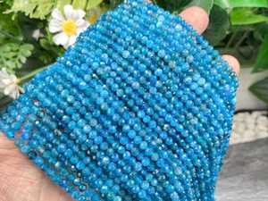 ลูกปัดอะพาไทต์สีน้ำเงินธรรมชาติ AA ทรงกลมเหลี่ยมเพชรพลอย ขนาด 2 มม. 3 มม. 4 มม. ลูกปัดพลอยขนาดเล็กสำหรับทำสร้อยข้อมือ สร้อยคอ DIY เครื่องประดับ - Product Image 1