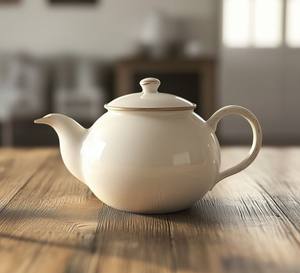 Théière élégante et minimaliste avec bec verseur lisse, poignée confortable, conception conservant la chaleur, idéale pour le service à thé moderne - Product Image 1