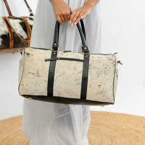 กระเป๋าเดินทางหนังวัววินเทจสำหรับผู้ชายและผู้หญิง - Product Image 1