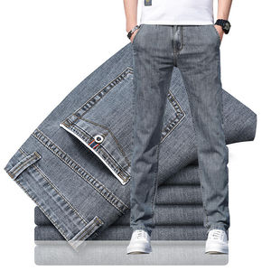 Jeans slim homme de haute qualité, coupe droite, taille mi-haute, en denim extensible, bleu/noir, avec poches boutonnées décoratives, vente en gros - Product Image 1
