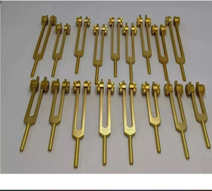 Ensemble de 9 diapasons lestés en or pour solfeggio et 9 chakras, accordés à 0,25 Hz pour la sonothérapie. - Product Image 1