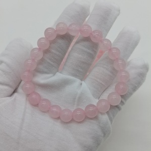 กำไลข้อมือคริสตัลสีชมพูทรงกลมขัดเงาขนาด 8 มม. ทำจากโรสควอตซ์ธรรมชาติ สไตล์รัก ประดับด้วยลูกปัด ยืดหยุ่นได้ เหมาะสำหรับทั้งชายและหญิง ขายส่ง - Product Image 2