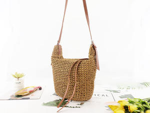 Discover the ultimate urban <b>accessory</b> with this stylish Natural yarn bag featuring a structured brown body and long shoulder - Product Image 2
