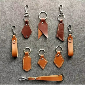 Llavero y llavero de cuero hechos a medida al por mayor hechos de cuero puro y genuino 100% para llaves a bajo MOQ y bajo precio - Product Image 1