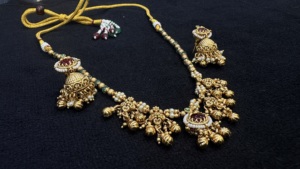 TISHYA DIAMOND Ethnic Gold Plated Alloy <b>Necklace</b> <b>and</b> <b>Earring</b> <b>Set</b> with Ruby <b>and</b> Imitation Pearl Tassel for Women <b>Bridal</b> Jewelry - Product Image 4