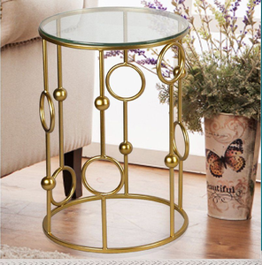 Flower-shaped side <b>table</b> <b>with</b> <b>mirrored</b> petal tabletop sections and gold metal frame legs, available at wholesale prices. - Product Image 5