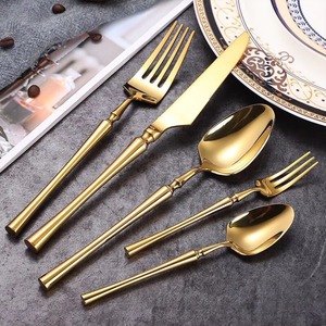 Juego de cubiertos de acero inoxidable de alta calidad en tonos cálidos para uso comercial y personal. - Product Image 1