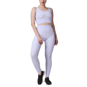 Ensemble de yoga sans couture 2 pièces : Crop top et leggings taille haute pour femme, tenue de sport couleur unie, dos nageur sans manches, longueur intégrale - Product Image 1