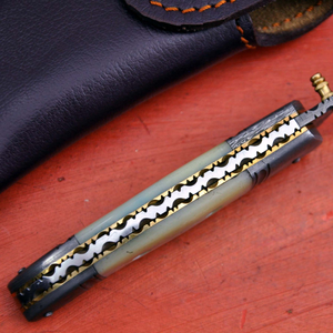 Cuchillo de caza Imperial de acero de Damasco con hoja de punta caída, filo biselado y funda de cuero - Product Image 4