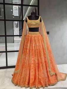 NiMa Creations Lehenga Choli en Soie Organza Orange, Robe de Mariage Traditionnelle pour Femme, Longueur au Sol, Style Inde Pakistan, Diwali - Product Image 1