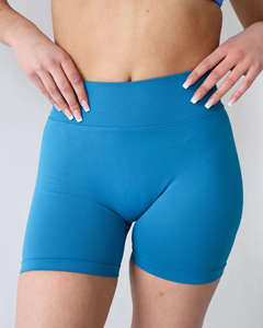 Shorts de yoga pour femmes en gros avec poches, taille haute élastique, séchage rapide, matière douce - Product Image 5