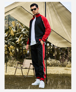 <b>zip</b>-<b>up</b> tracksuits. Modern contrast-panel design with sharp <b>white</b> accents and comfortable tapered joggers. - Product Image 3