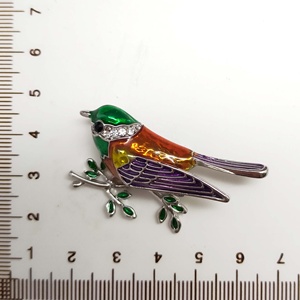 Bird Branch Brooch with Vibrant <b>Hand</b>-Painted Enamel in Emerald and Sunset Tones Elegantly Perched on Silver - Product Image 2