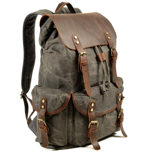 Meilleures ventes : Sacs à dos en cuir grande capacité pour l'université et l'école, sacs à dos en cuir véritable avec plusieurs poches latérales et frontales - Product Image 6