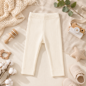 Leggings en maille côtelée légère et crémeuse, offrant une texture douce et extensible, et une qualité respirante pour les enfants élégants au quotidien. - Product Image 1