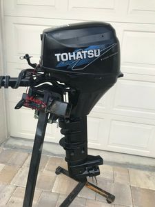 Moteur hors-bord Tohatsu 9.8HP 4 temps 15 pouces à arbre long, modèle 2011, en promotion, livraison immédiate, avec capot d'hiver 100% coton uni à l'avant - Product Image 2