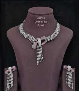 Collier et boucles d'oreilles élégants avec nœud en zircon cubique, laiton plaqué rhodium, bijoux de mariage pour femmes - Product Image 3