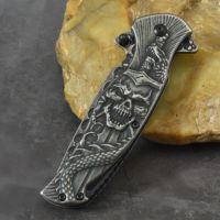 Couteau pliant en acier inoxydable, lame Zombie Drop Point, manche Crâne Dragon, couteau de poche de qualité industrielle avec bouton de réglage au pouce