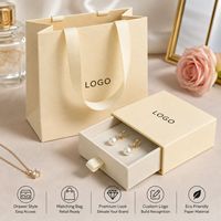 Ensemble d'emballages de bijoux personnalisés avec boîte coulissante et sac en papier avec ruban pour les acheteurs en gros et les importateurs de boutiques