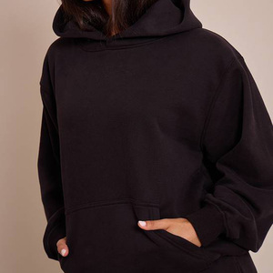 Sweat-shirt à capuche noir surdimensionné pour femme, en tissu de qualité supérieure, décontracté, à manches longues, avec poche avant. - Product Image 1