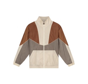 Veste coupe-vent grande taille de qualité supérieure, vente en gros, vêtements en nylon avec patchwork personnalisé, veste imperméable à séchage rapide - Product Image 1