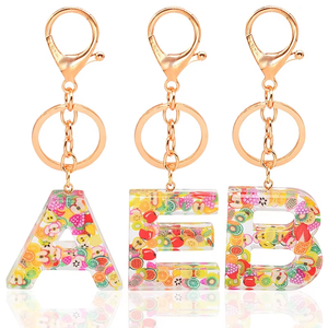 Porte-clés en résine époxy incrustée de feuille d'or, unique, élégant, vif, exquis, idéal pour un cadeau, populaire, faible MOQ, vente en gros - Product Image 5