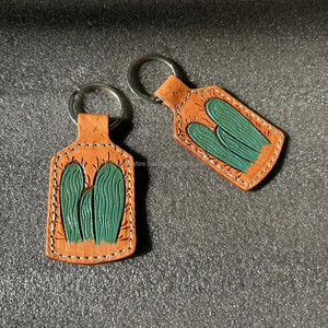 ห่วงโซ่กุญแจหนังที่แกะสลักด้วยมือรูปทรงแปลกใหม่น่ารักอุปกรณ์เสริมพวงกุญแจหนังสำหรับทุกเพศ - Product Image 2