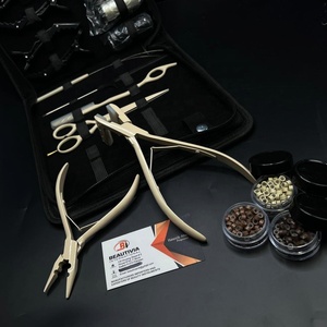 Meilleure vente Kit d'outils d'extension de cheveux de couleur nue professionnelle Micro perles Presse à ruban en acier inoxydable Pince à 2 trous Étui en cuir - Product Image 1