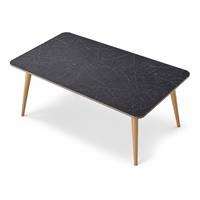 Table de conférence rectangulaire moderne avec plateau aspect pierre noire et pieds en bois angulaire pour projets de bureau