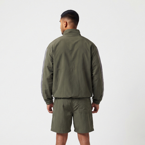 Shorts de sport amples pour hommes à séchage rapide avec cordon de serrage à la taille, poches latérales, légers en polyester, coupe ample, longueur genou, coupe-vent - Product Image 2
