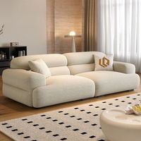 Canapé d'angle contemporain haut de gamme en cuir véritable, avec structure en bois courbée, pour salon, vente en gros