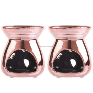 เตาอโรมาเซรามิกทองแดง พร้อมที่อุ่นเทียนหอม ดีไซน์ลายดาวและพระจันทร์ - Product Image 4